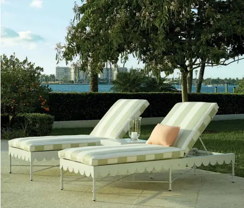  ??  ?? Chaise Lounges from the Awning Collection of outdoor furnishing­s by Celerie Kemble add a touch of old-school glamour.