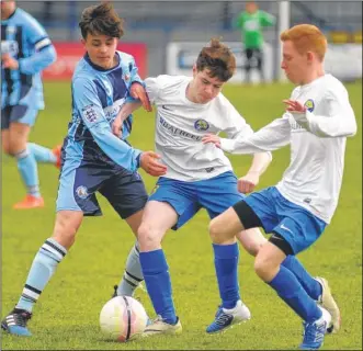  ?? FM4768531 ?? Barming Colts, left, and Kings Hill get stuck in as the under-15 final hots up