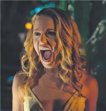  ??  ?? Jessica Rothe screams herself silly in the film Happy Death Day, and below, Rothe and actor Israel Broussard