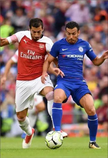  ??  ?? Henrikh Mkhitaryan of Arsenal in action against Pedro of Chelsea during the Internatio­nal Champions Cup match between Arsenal and Chelsea at the Aviva Stadium in Dublin on Wednesday.