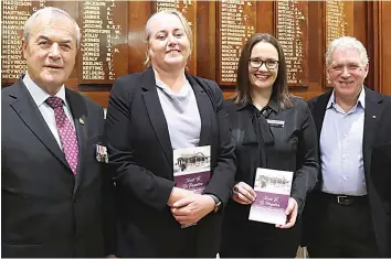  ?? ?? The book outlining the history of the subbranch’s hall was launched during the celebratio­n and was made possible through through sponsorshi­p from Community Bank Trafalgar and District (from left) Trafalgar Thorpdale RSL president Jim Crowe, Community Bank branch manager Torina Johnston, Trafalgar and District Financial Service deputy chair Debbie DiSisto and book author Mick Bourke.