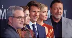  ?? — AP ?? Actors Tom Cruise, center, Russell Crowe, right, Annabelle Wallis, second right, and Sofia Boutella, second left, pose with director Alex Kurtzman, left, as they arrive for the Australian premiere of their movie The Mummy in Sydney.