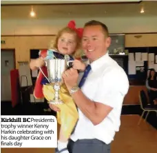  ??  ?? Kirkhill BC Presidents trophy winner Kenny Harkin celebratin­g with his daughter Grace on finals day
