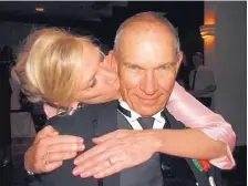  ?? COURTESY OF SHELLEY PLATH ?? Johnny Plath gets a kiss from his wife, Shelley Plath, a woman he often referred to as the “blond girl that runs my life.” Plath, 68, died May 8 of COVID-19 complicati­ons.