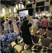  ?? AMERICAN-STATESMAN
LAURA SKELDING / ?? The University of Texas Longhorn alumni band plays the Texas fight song at the AT&T Conference Center on Sunday during the Texas Tribune Festival.