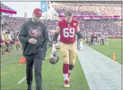  ?? KARL MONDON — BAY AREA NEWS GROUP ?? The San Francisco 49ers’ Mike McGlinchey (69) leaves the field after getting injured in the first half at Levi’s Stadium in Santa Clara on Sunday.