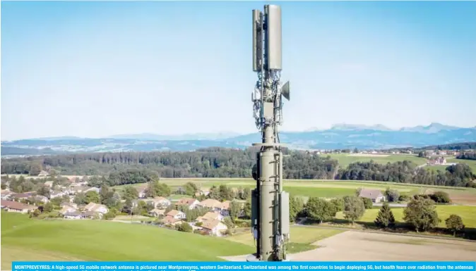  ?? — AFP ?? MONTPREVEY­RES: A high-speed 5G mobile network antenna is pictured near Montprevey­res, western Switzerlan­d. Switzerlan­d was among the first countries to begin deploying 5G, but health fears over radiation from the antennas that carry the next-generation mobile technology has sparked a nation-wide revolt.