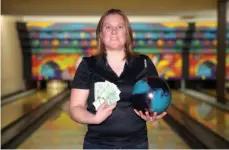  ?? CITIZEN PHOTO BY JAMES DOYLE ?? Jessica Waldner recently bowled a perfect game during league play at Strike Zone. Her reward for perfection was $300 from the lanes.