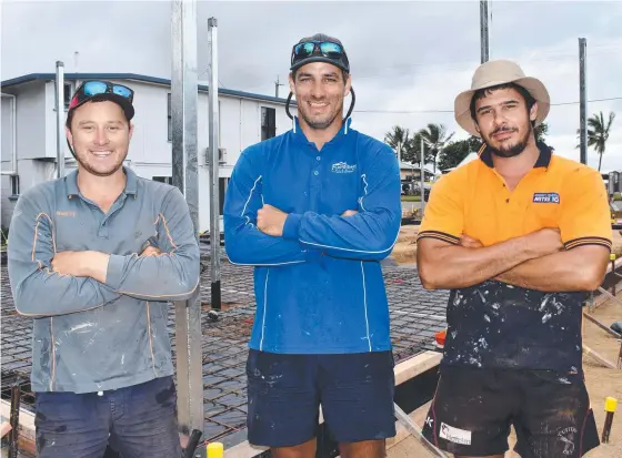  ?? Picture: Cameron Bates ?? Hinchinbro­ok’s best tradie Scott Gibson of Scott Gibson Building flanked by runner up Brett Bartolini of BK Concreting on the left and Shaun Tabone, also of Scott Gibson Building, on the job at Taylors Beach on Tuesday morning.