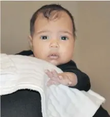  ?? Twitter/kimkardash­ian ?? The world received its first look at Kanye West and Kim Kardashian’s daughter North with this photograph released on Twitter.