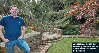  ??  ?? CHAMPION DISPLAY: Former gold medal winner Alan Rudden in a garden he designed