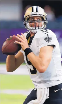  ?? JIM MONE/ASSOCIATED PRESS ?? New Orleans quarterbac­k Drew Brees, who averages 334 yards and nearly three touchdowns per game at home, should be a great fantasy option this week as the Saints host the Patriots.