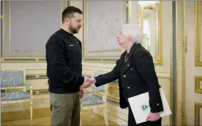  ?? ?? The Associated Press
Ukrainian President Volodymyr Zelenskyy (left) and U.S. Treasury Secretary Janet Yellen shake hands during their meeting in Kyiv, Ukraine, Monday.