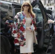  ?? AP FILE PHOTO ?? U.S. first lady Melania Trump steps out of a car as she arrives at Chierici Palace, part of a visit of the G7first ladies in Catania, Italy. Trump’s first outing in the Sicilian sunshine was in a colorful floral applique jacket by Dolce & Gabbana that...