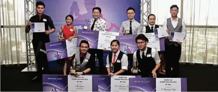  ??  ?? ( Front row, from left) Champion Ryan Phang Shee Zhe, first runner- up Bau Yi Wen and second runner- up Chang Lai Teng of the mocktail category during the Monin Cup Student Malaysia 2016.