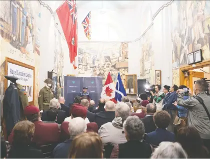  ?? TROY FLEECE ?? Before a packed room at the Royal Canadian Legion in Regina, Minister of Veterans Affairs Lawrence Mcauley acknowledg­ed that Metis veterans weren’t treated fairly after the Second World War despite the sacrifices they made while fighting for Canada.