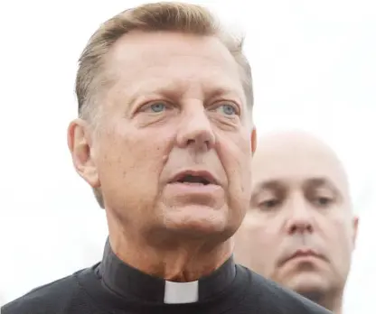  ?? SUN-TIMES FILE ?? The Rev. Michael Pfleger has been temporaril­y removed from ministry at St. Sabina while the archdioces­e investigat­es allegation­s of decades-old sexual abuse against the priest.