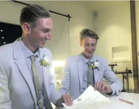  ??  ?? Commonweal­th Games sprinter Craig Burns and athlete Luke Sullivan tied the knot just minutes after midnight. yesterday.