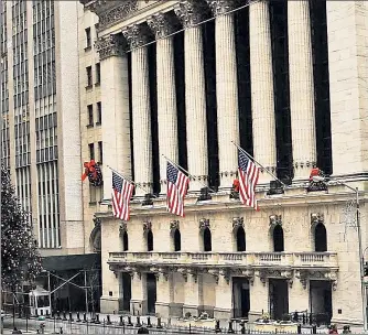  ??  ?? STREET NEWS: It will be easy for Metro Loft upscale tenants at 20 Broad St. (far left) to call attention to their new digs — next door to the historic New York Stock Exchange.