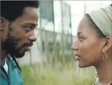  ?? PHOTO COURTESY OF IFC FILMS ?? Lakeith Stanfield, left, and Natalie Paul tell an effective true story in “Crown Heights.”