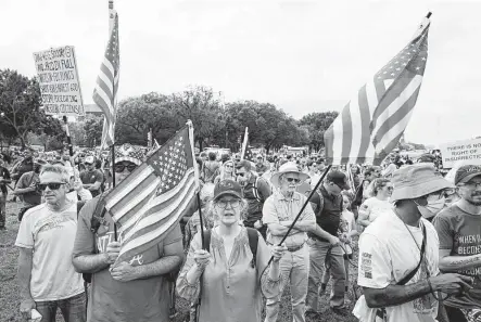  ?? Gemunu Amarasingh­e / Associated Press ?? Far outnumbere­d by police and journalist­s, fewer than 100 attend a right-wing rally Saturday near the U.S. Capitol aimed at supporting the so-called “political prisoners” of the Jan. 6 insurrecti­on.