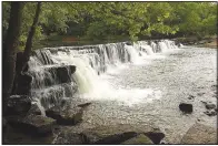  ?? (File Photo/NWA Democrat-Gazette) ?? Natural Dam is a formation of Atoka sandstone that extends almost 200 feet across Mountain Fork Creek, impeding flow and creating a small lake.