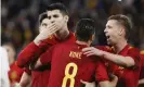  ?? Photograph: Lavandeira/EPA ?? Àlvaro Morata celebrates with teammates during Spain’s 5-0 win against Iceland.