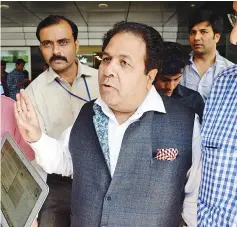  ?? — AFP photo ?? This file photo taken on February 19, 2016 shows Indian Premier League (IPL) chairman Rajeev Shukla (C) being surrounded by journalist­s after attending a special meeting at the Board of Control for Cricket in India (BCCI) headquarte­rs in Mumbai.