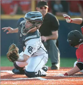  ?? NWA Democrat-Gazette/ANTHONY REYES @NWATONYR ?? Kyle LaRoche (left) of Shiloh Christian makes the catch as Emmanuel Baisch of McDonald County, Mo., slides safely home Monday at Shiloh Christian in Springdale.