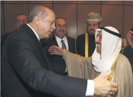  ?? KAYHAN OZER — POOL PHOTO ?? On Dec. 13, 2017, Turkey’s President Recep Tayyip Erdogan, left, welcomes Kuwait’s Emir Sheikh Sabah Al Ahmad Al Sabah in Istanbul.