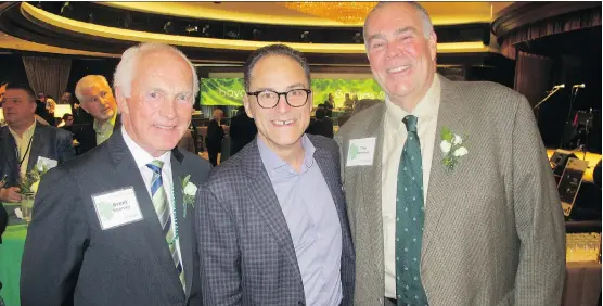  ?? PHOTOS: BILL BROOKS ?? Joining Alberta Finance Minister Joe Ceci, centre, at Boyden Global Executive Search’s Guinness & Green St. Patrick’s Day bash at the Calgary Petroleum Club are Boyden partner Brent Shervey, left, and Tim Hamilton. The fun fete raised nearly $50,000...