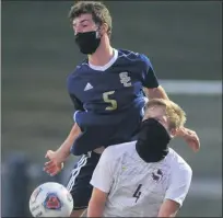  ??  ?? Host Stoney Creek’s Carl Beyer, left, tangleswit­h Birmingham Seaholm’s Luke Hanson during Tuesday’s OAA Redmatch.