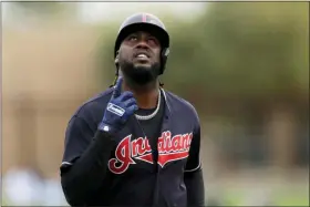  ?? GREGORY BULL — THE ASSOCIATED PRESS ?? Cleveland Indians’ Franmil Reyes points skyward after hitting a home run during the second inning of a spring training baseball game against the Chicago White Sox, Friday, Feb. 28, 2020, in Glendale, Ariz.