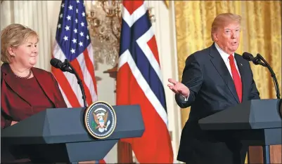  ?? SHEN TING / XINHUA ?? US President Donald Trump holds a joint news conference with Norwegian Prime Minister Erna Solberg at the White House in Washington on Wednesday. Trump said a “fairer deal” might coax US back into the Paris climate accord.