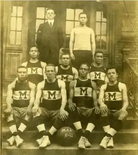  ?? Detre Library and Archives, Heinz History Center ?? The 1911-12 Monticello­s, consensus national Black basketball champions. Cum Posey is second from left in front row. His brother Seward “See” Posey is in the middle of the second row.
