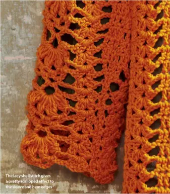  ??  ?? The lacy shell stitch gives a pretty scalloped effect to the sleeve and hem edges