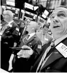  ?? AP ?? Traders on the floor of the New York Stock Exchange on April 18. The stock market keeps going higher, but fees to own funds keep going lower.