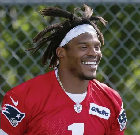  ?? Ap FIle ?? INFECTIOUS ENTHUSIASM: Cam Newton was named the Patriots’ starting quarterbac­k and a team captain.