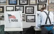  ?? LARRY W. SMITH/EPA ?? Since the 2010 midterm elections, 10 states have imposed stricter voter ID laws, seven have made registrati­on more difficult and six have cut early voting opportunit­ies.