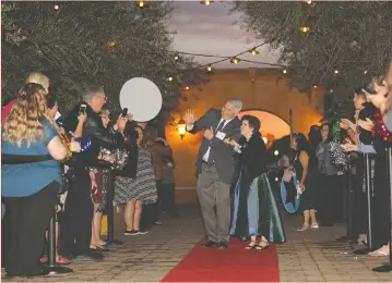  ?? BEA AHBECK/NEWS-SENTINEL ?? Katie Miller arrives on the red carpet with her ‘Buddy’ Brian Crosson during the Night to Shine prom, sponsored by the Tim Tebow Foundation, at Viaggio Winery in Acampo on Friday night.