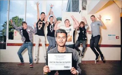  ??  ?? Jumping for joy: The Mt Albert YMCA Raise Up crew’s work with local youth has been recognised by the Albert-Eden Local Board at its first community awards. Pictured with the crew is the YMCA’s Daylyn Concessio.