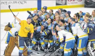  ?? AP PHOTO ?? In this Jan. 24, 2016, file photo, National Women’s Hockey League All-star players take time for a “selfie” before the start of an all-star game at Harborcent­er in Buffalo, N.Y. NWHL founder and commission­er Dani Rylan tells The Associated Press she considers the likelihood of North America having one women’s profession­al hockey league as being “inevitable.”