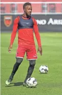  ??  ?? Junior Flemmings of Phoenix Rising FC practices with the team at their Scottsdale field on Tuesday.