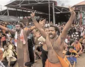  ??  ?? Protesters oppose the entry of women to the Sabarimala Temple on Friday.