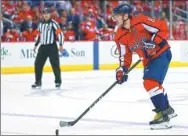  ?? AMBER SEARLS / USA TODAY SPORTS ?? Washington Capitals’ Alex Ovechkin sizes up his options against the Montreal Canadiens in their NHL game in Washington DC on Saturday. Ovechkin scored four goals to register back-to-back hat-tricks as the host won 6-1.