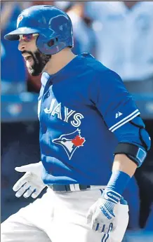  ?? AP ?? BELT-ISTA: Jose Bautista exults after his three-run homer vaulted the playoff-bound Blue Jays to a 10-8 triumph over the Rays on Saturday in Toronto.