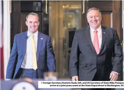  ??  ?? > Foreign Secretary Dominic Raab, left, and US Secretary of State Mike Pompeo arrive at a joint press event at the State Department in Washington, DC