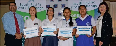  ?? Photo: Simione Haravanua ?? From left: Reserve Bank of Fiji governor Ariff Ali, Grace Fong, Aftareen Khan, Dhaveeta Kumar, Neha Sharma and South Pacific Stock Exchange chairperso­n Nur Bano Ali during the announceme­nt on September 17, 2018.