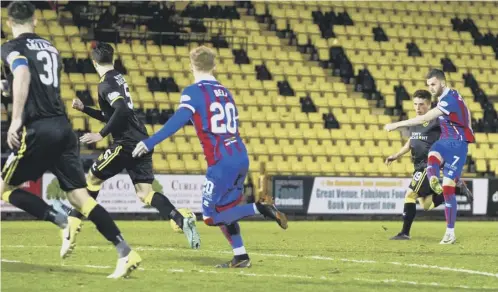  ??  ?? 0 Liam Polworth thumps home a low drive to secure a vital victory for Inverness over Livingston at the Tony Macaroni Arena last night.