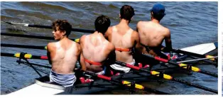  ?? ?? Back burner: Rowers on the Thames in Hammersmit­h, west London... and new graduates Rosie Spicer and Emily Barr in Brighton